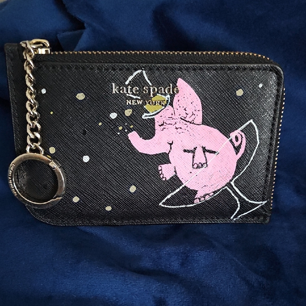 kate spade black coin pouch with pink elephant and gold accents